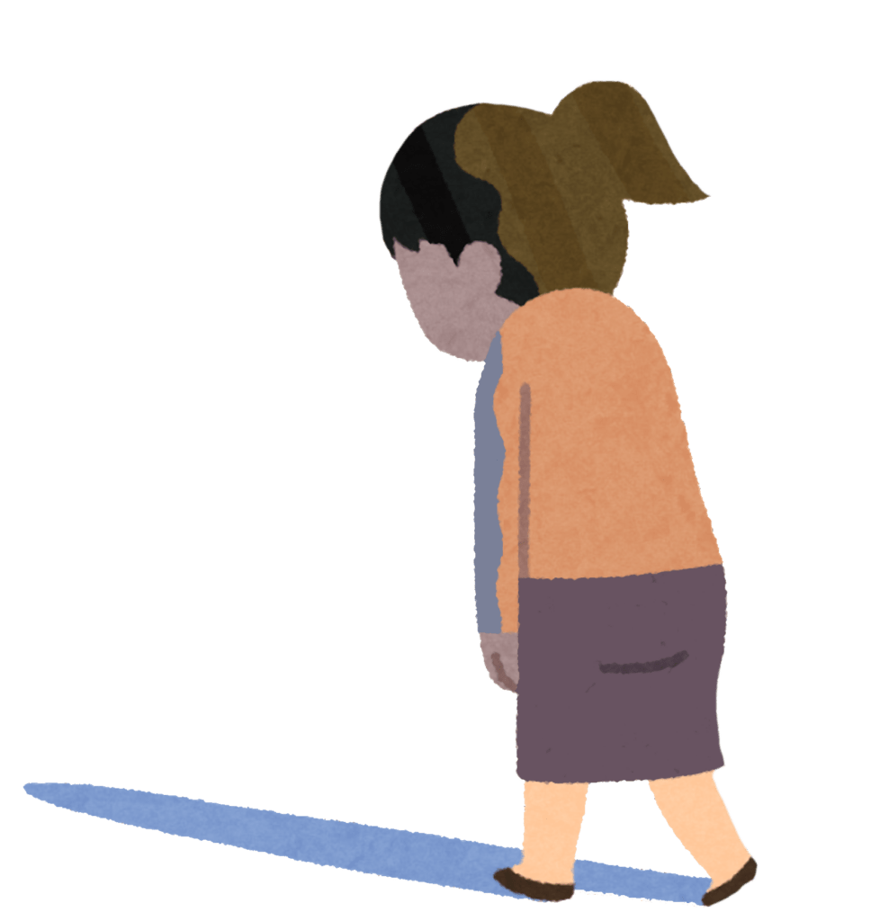 Personne marchant de dos avec les épaules voûtées, projetant une ombre allongée au sol, symbolisant la fatigue intérieure.